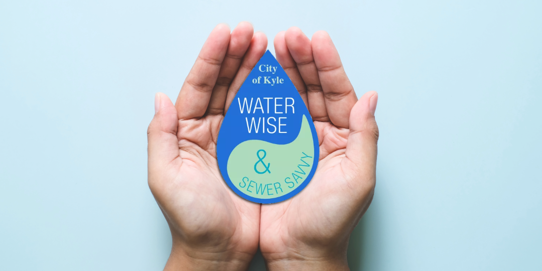Two hands gently cup a blue water droplet-shaped logo. The droplet reads 'City of Kyle Water Wise & Sewer Savvy,' with the lower section in light green containing an ampersand and the words 'Sewer Savvy.' The background is a plain light blue surface.